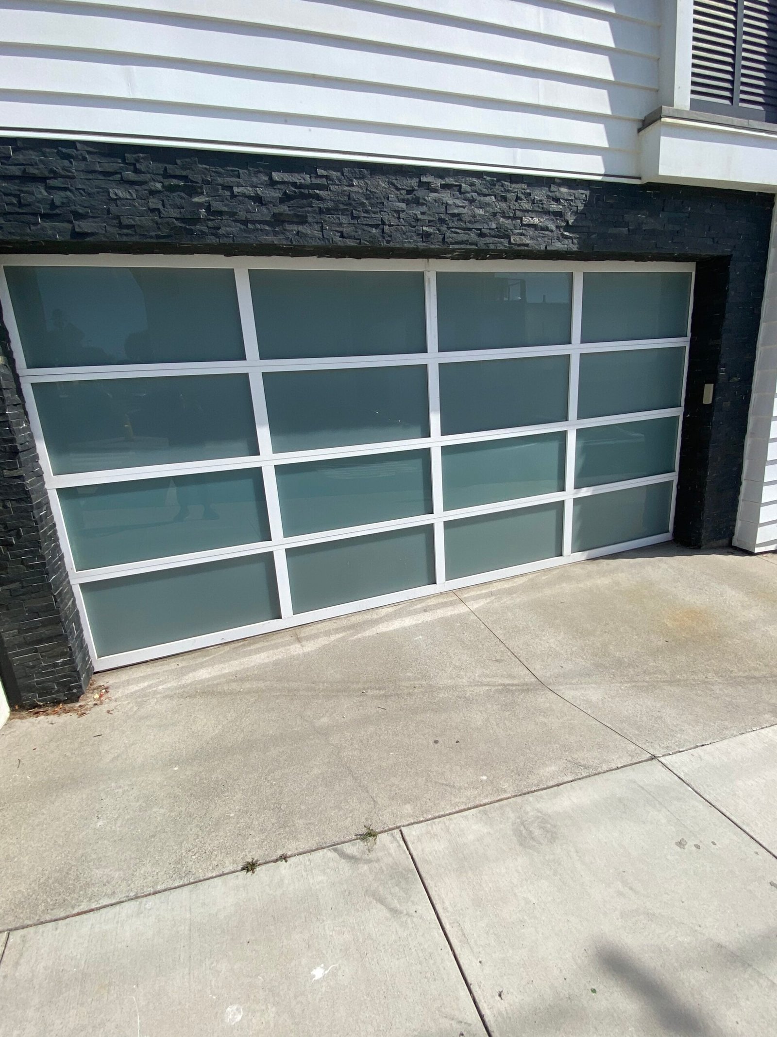 Modern glass garage door installation in Norwalk CA
